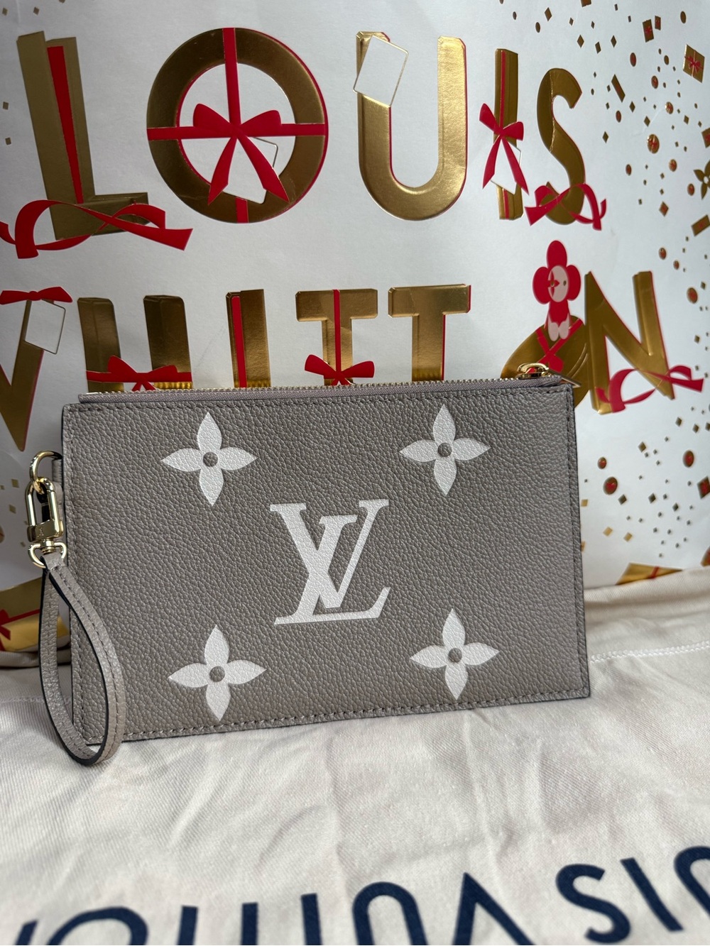 Louis Vuitton NeoNoe Bicolor Monogram Empreinte Giant MM wristlet